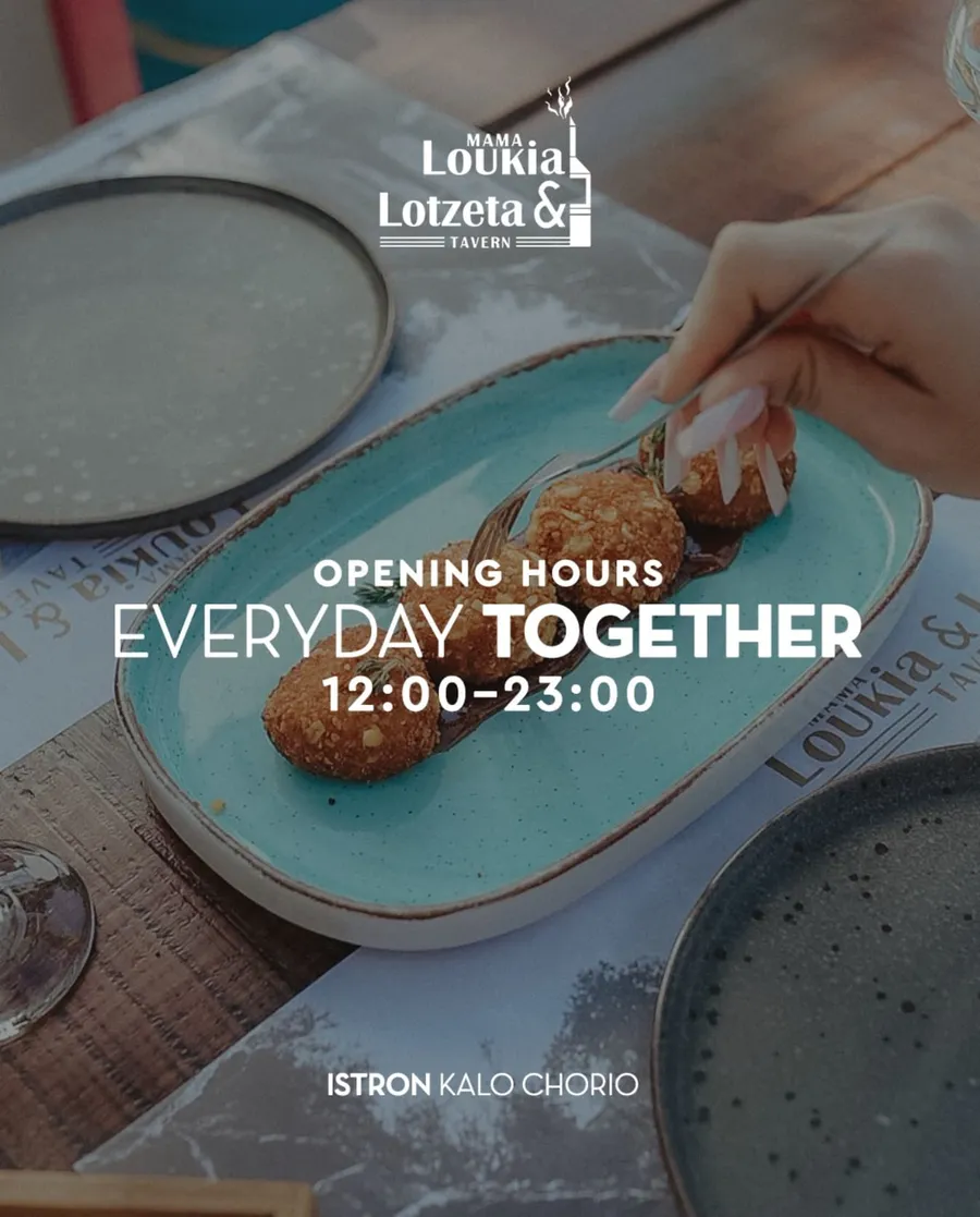 Traditional cheese fritters on a plate with restaurant opening hours displayed nearby