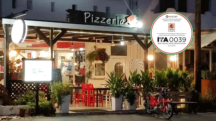 Italian restaurant interior at Valeria Pizza & Pasta with tables and dining area